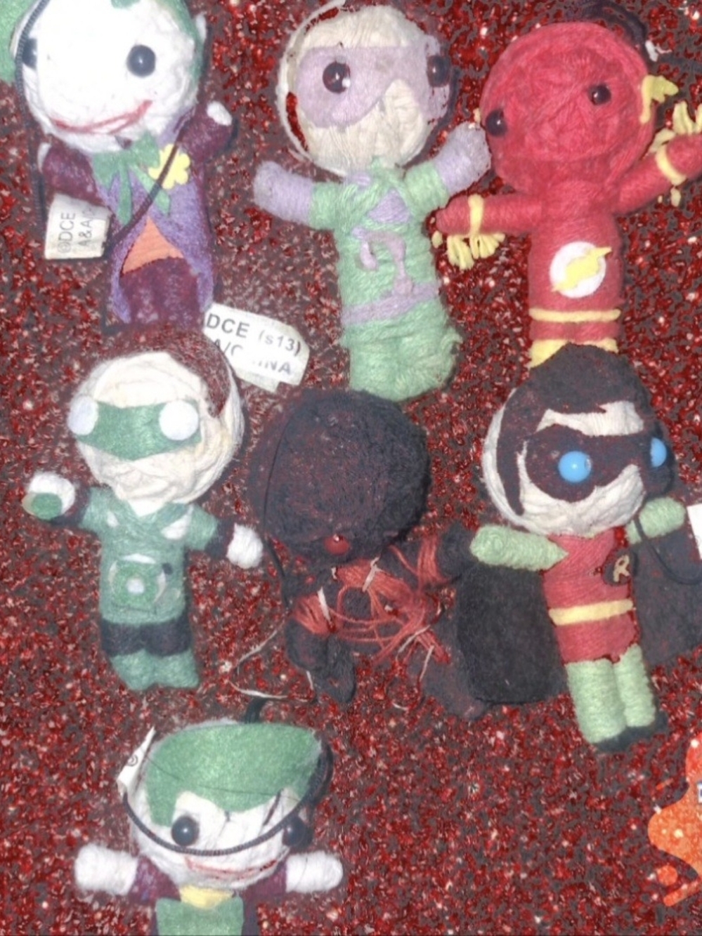 7 officially licensed DC Comics string dolls / voodoo-style keychains